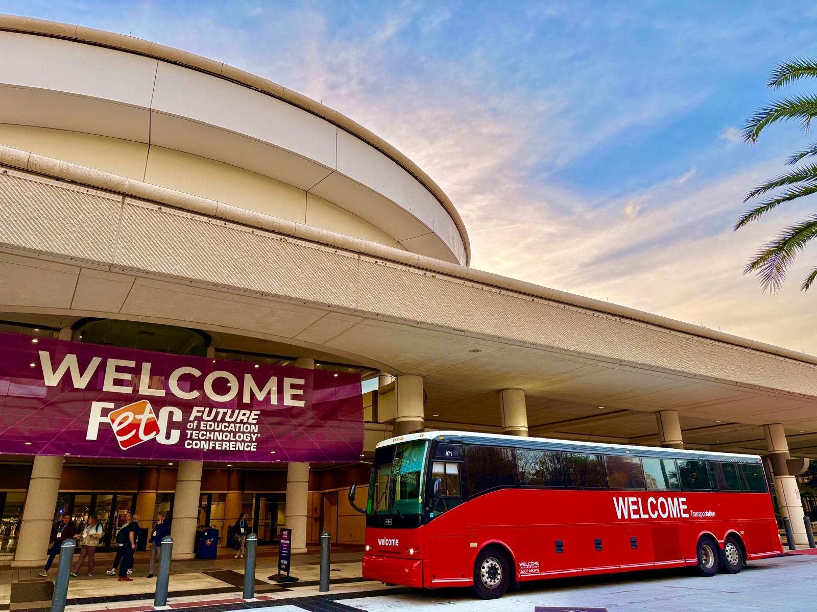 Welcome Transportation red charter bus
